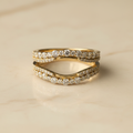 14kt yellow gold natural diamond ring wrap lifestyle photo on marble